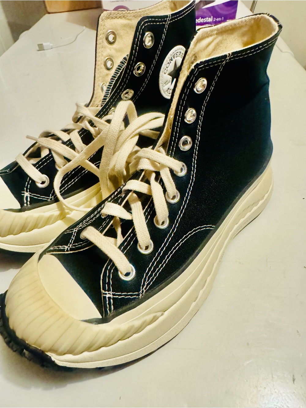 Converse High Top Sneakers in Black and Cream